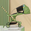 Carucior transformabil si pliabil, Verde, Pentru copii intre 0 si 36 luni, Sezut rotativ 360 grade cu centuri de singuranta si cos de depozitare, Copertina de ploaie si plasa insecte